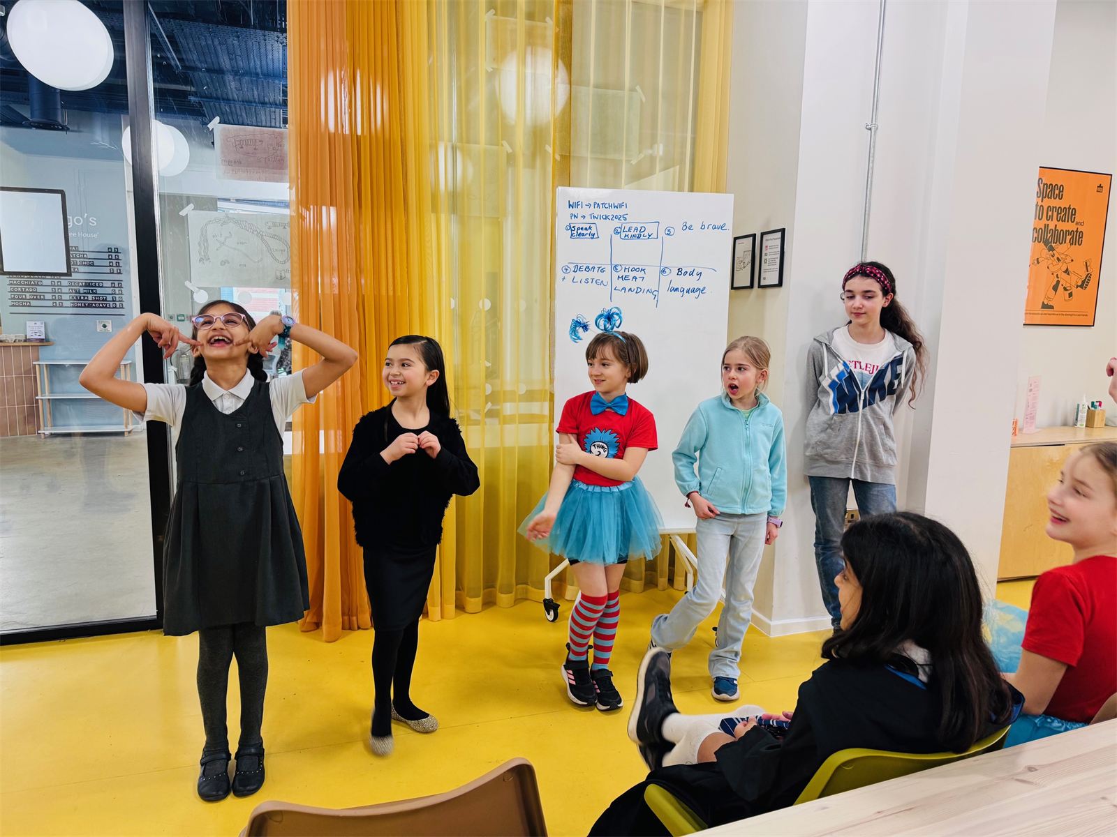 Children presenting to parents at a Configur Academy session